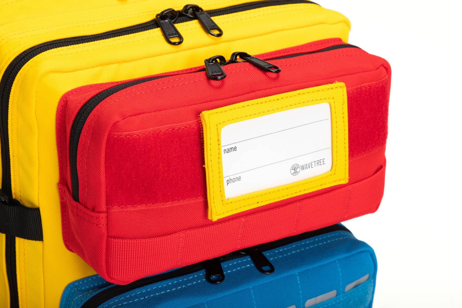 Wavetree packback with a name patch attached with velcro