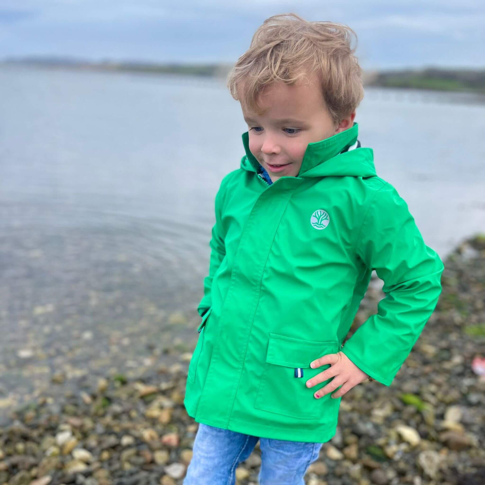 Boy wearing Green Classic Raincoat by Wavetree