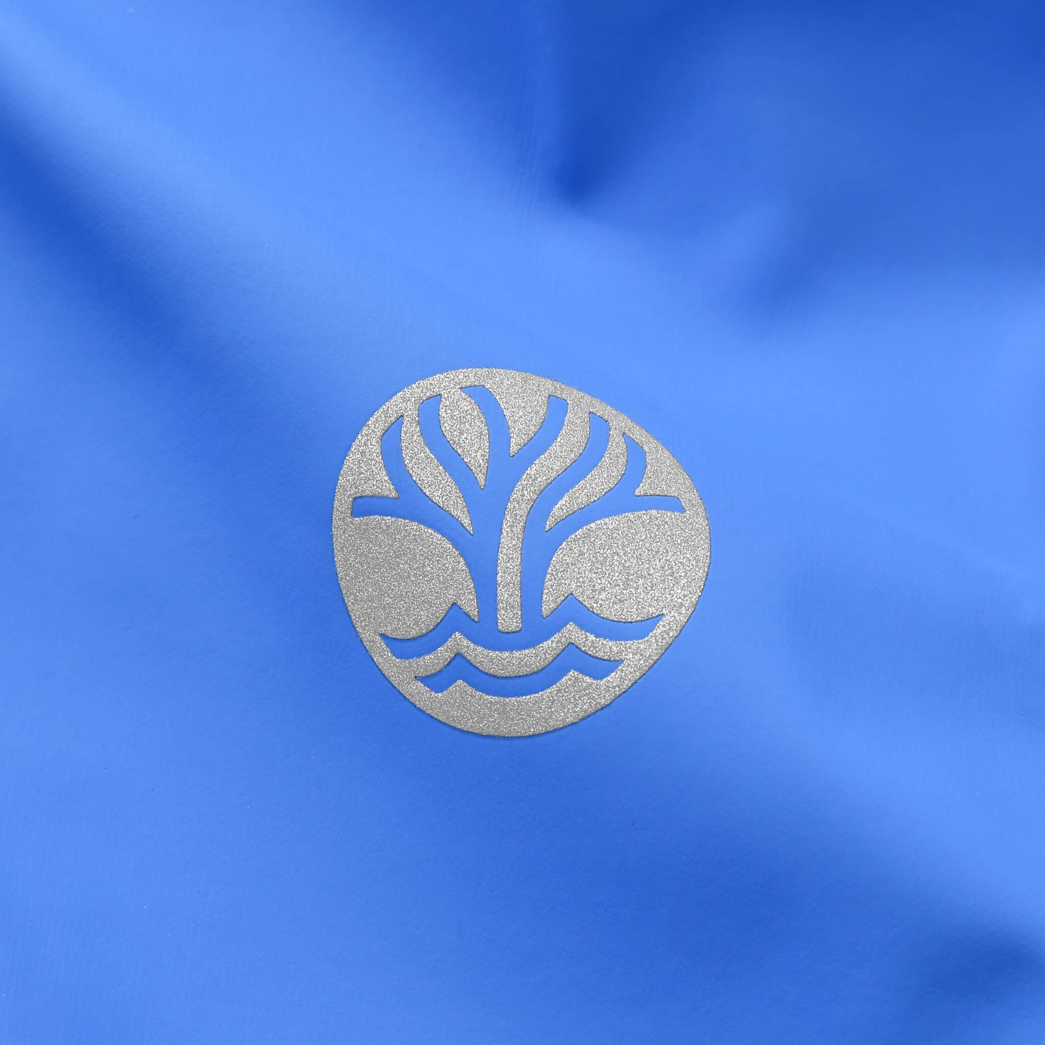 Reflective Wavetree Logo on Blue Raincoat