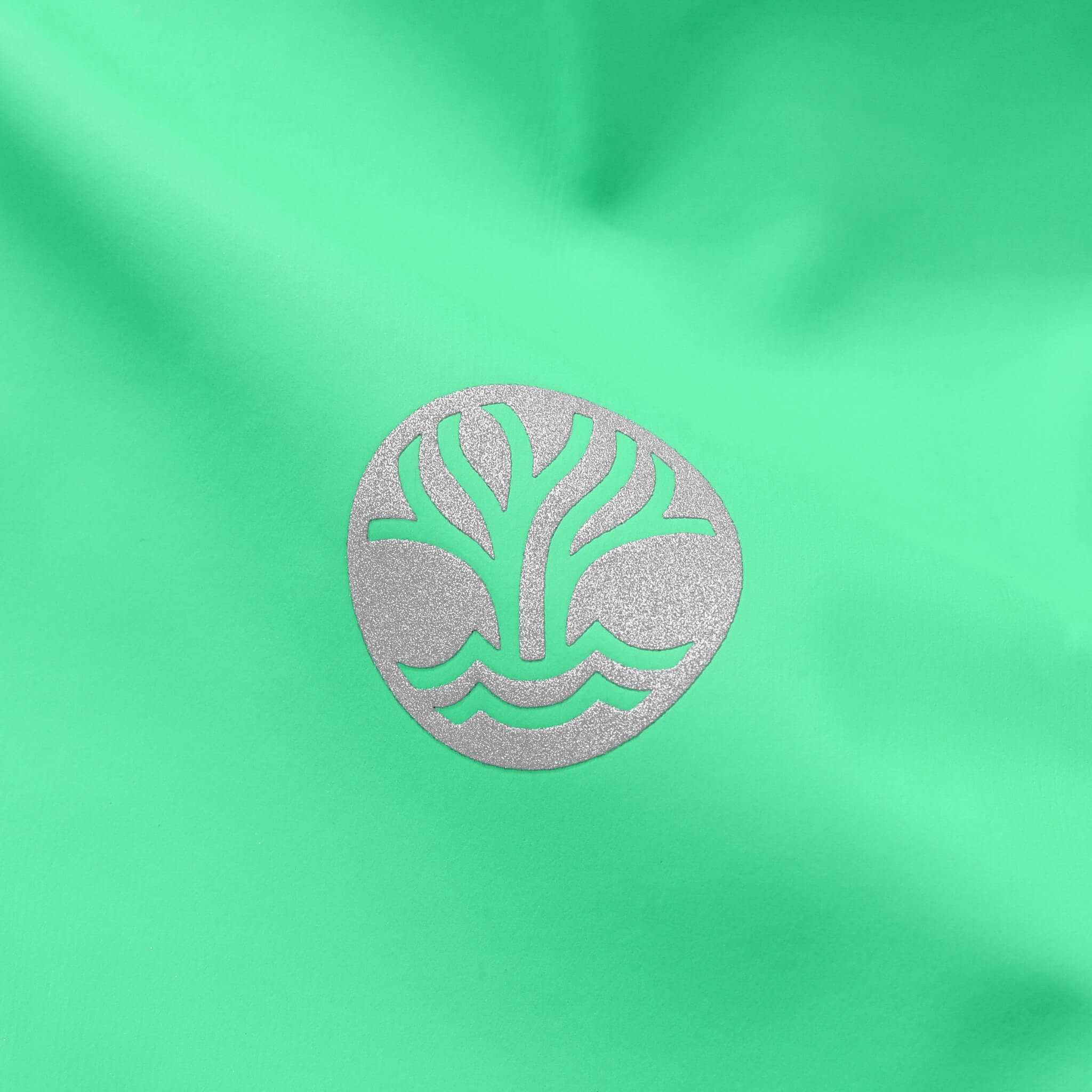 Reflective Wavetree Logo on Green Raincoat